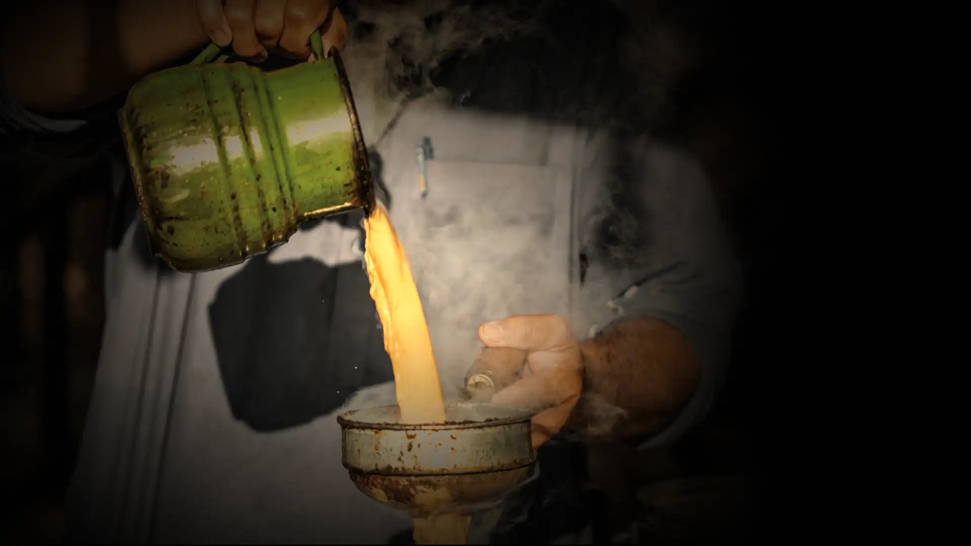 Karachi ki Chai poured from an enamel pot through a strainer, steam rising